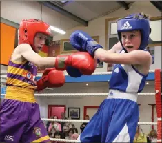  ??  ?? Wexford’s Fionn O’Leary takes on Wicklow’s Sean Byrne.