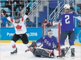  ?? NATHAN DENETTE THE CANADIAN PRESS ?? Natalie Spooner celebrates her second-period goal on United States goaltender Madeline Rooney on Thursday.