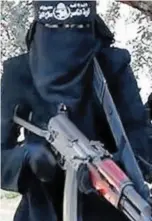  ??  ?? Jihadi recruits: Gun-toting members of Islamic State’s all-female unit in Raqqa, Syria