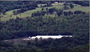  ?? Arkansas Democrat-Gazette/MITCHELL PE MASILUN ?? The C&H Hog Farms complex, shown in May 2017, is located on Big Creek 6.6 miles from where the creek flows into the Buffalo River.