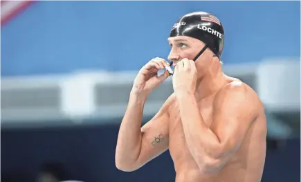  ??  ?? Under his ban, Olympic gold medalist Ryan Lochte can’t compete again until July 2019.