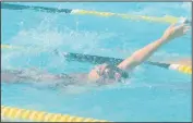  ?? STAFF PHOTOS BY TED BLACK ?? Smallwood swimmer Nathalie LaFontant contests the backstroke leg of the girls 13-14 100 IM on Saturday morning in the PrinceMont All-Star meet at West Arundel in Laurel. LaFontant finished third in that event after earlier finishing second in the 50...