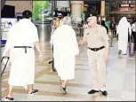  ?? KUNA photos ?? Above: Some of the pilgrims leaving for Hajj at the Kuwait Int’l Airport.