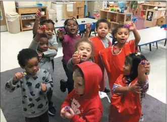  ?? SUBMITTED PHOTO ?? Montgomery Early Learning Centers, which operates 10 early learning centers in Montgomery and Philadelph­ia counties, has changed its name to Wonderspri­ng. The new name, according to the organizati­on, better reflects its philosophy and geography. This photo shows some of the children at Wonderspri­ng’s Pottstown location at 150 N. Hanover St. showing off an art project featuring springs.