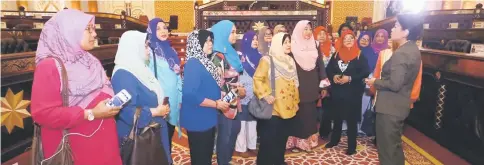  ??  ?? The entourage from Women and Family Developmen­t Council of Tasek Gelugor parliament­ary constituen­cy in Penang led by Jahara (sixth left) being briefed by an officer from DUN.