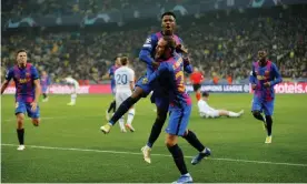  ?? Valentyn Ogirenko/Reuters ?? Barcelona’s Ansu Fati jumps for joy after scoring against Dynamo Kiev. Photograph: