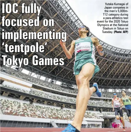  ?? (Photo: AFP) ?? Yutaka Kumagai of Japan competes in the men’s 5,000mt12 category during a para-athletics test event for the 2020 Tokyo Olympics at the National Stadium in Tokyo on Tuesday.
