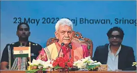  ?? WASEEM ANDRABI/HT ?? Jammu and Kashmir lieutenant governor Manoj Sinha addressing a press conference after hosting G20 delegates at the Raj Bhawan in Srinagar.