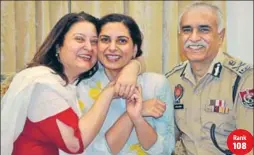  ?? KARUNS SHARMA/HT ?? n Rank 108 Megha Arora with her father, Punjab DGP Suresh Arora, and her mother in Chandigarh on Friday. This was her third attempt.