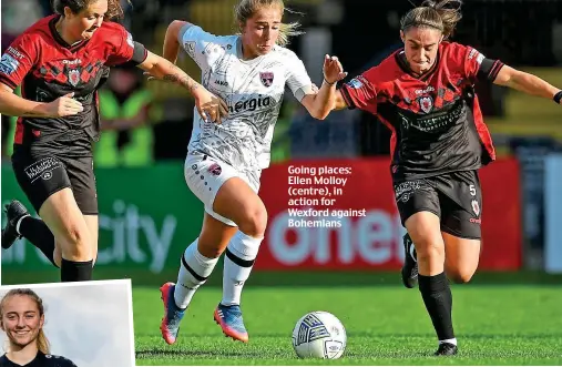  ?? ?? Going places: Ellen Molloy (centre), in action for Wexford against Bohemians