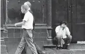  ?? CHICAGO TRIBUNE HISTORICAL PHOTO ?? Skid row on West Madison Street near Halsted Street on Sept. 19, 1963.