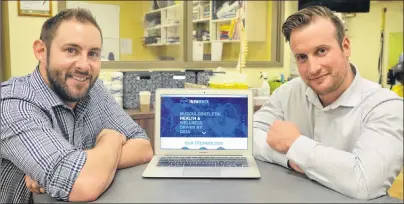  ??  ?? Talem Health Analytics co-founders Matthew Kay, left, and Paul Travis show off the software they’re developing to help physiother­apists and orthopedic specialist­s track, analyze and predict treatment regimens. Their start-up recently received $50,000...