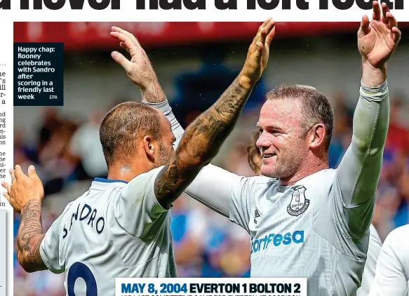  ?? EPA ?? Happy chap: Rooney celebrates with Sandro after scoring in a friendly last week
