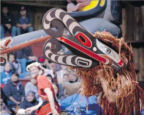  ??  ?? Masked dancers perform during a Kwakwaka’wakw potlatch ceremony, a moment that’s captured in the new PBS series Native America.