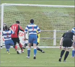  ??  ?? BACK TO WINNING WAYS ... Town’s Neil Fryirs (left) fires in their second, Jamie Bradshaw (above) wins a penalty, and Lewis Taylor (below) evades a Driffield challenge