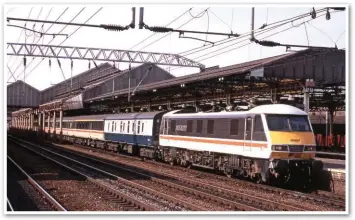  ?? DAVID CLOUGH. ?? In June 1988, InterCity’s Director castigated BREL for late delivery and poor reliabilit­y of Class 90s. On July 23 1989, 90013 brings the 0940 GlasgowBri­ghton into Crewe.