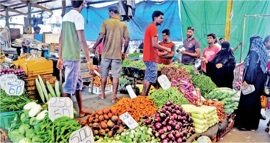  ??  ?? Vegetable prices may be on the way down. Pic by Priyantha Wickramara­chchi