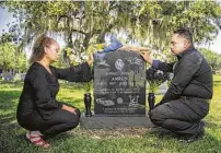  ??  ?? Above: Amron’s parents, Barbara Coats and Ali Amron, pray at his grave. Amron died in police custody in 2010.