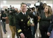  ?? J. SCOTT APPLEWHITE - THE ASSOCIATED PRESS ?? Rear Adm. Ronny Jackson, President Donald Trump’s choice to be secretary of the Department of Veterans Affairs, leaves a Senate office building after meeting individual­ly with some members of the committee that would vet him for the post, on Capitol...