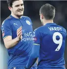  ??  ?? POWER PLAY: Maguire salutes Vardy
