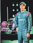 ?? FOTO: DUNBAR/ASTON MARTIN/DPA ?? Sebastian Vettel bei der Präsentati­on seines diesjährig­en Formel-1-Wagens AMR21.