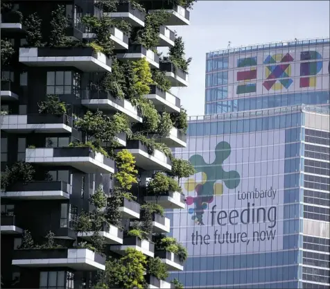  ??  ?? The Lombardia Region building in Milan, Italy, part of the “vertical forest” towers in the Porta Nuova area.