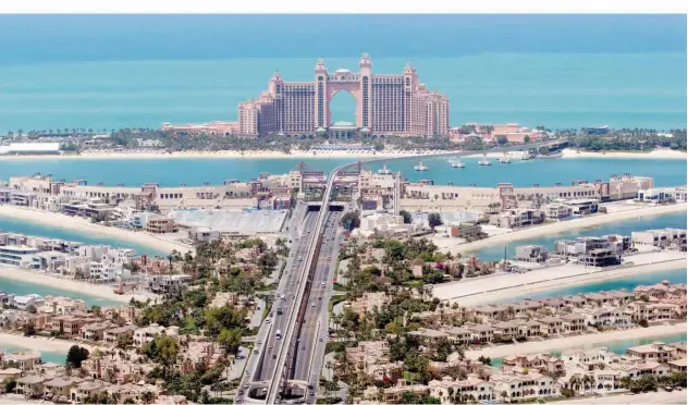  ?? Kamal Kassim / Gulf Today ?? ↑
Palm Jumeirah enhances the beauty of Dubai.