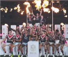  ?? Picture: AAP IMAGE ?? The Roosters claim their trophy.