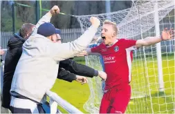  ?? FJA Photograph­y – Paul Watson ?? Delight for Runcorn Town striker Mark Reed and fans after his match-winner against Hanley Town on Monday evening.