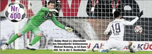  ??  ?? Bobby Wood (r.) überwindet den Düsseldorf­er Schlussman­n Michael Rensing, es ist Aues 400. Tor in der 2. Bundesliga.