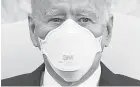  ?? MANDEL NGAN/AFP VIA GETTY IMAGES ?? President Joe Biden’s administra­tion plans to dole out masks across the nation.