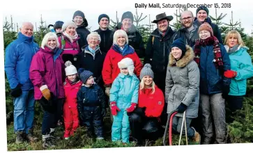  ??  ?? Festive ritual: The Pollocks and Cowans gather to cut their trees every year