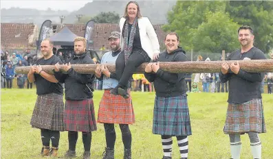  ??  ?? Rising star Games Chieftain Kari Carswell with the‘heavies’at last year’s games