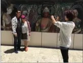  ?? LIA ZHU / CHINA DAILY ?? Liu Zichen (left), a Chinese student at a Los Angeles college, and his mother (right) and aunt visit the Getty Center in Los Angeles on their summer vacation.