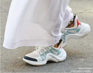  ??  ?? White and blue Louis Vuitton sneakers.