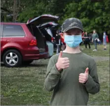  ??  ?? Pine Forge fifth grader Chance Ascher gave the drive-in movie experience a double thumbs up. Pine Forge Elementary students and families attended the Pine Forge Fifth Grade Recognitio­n Night at the Boyertown State Theatre’s Sunnybrook Ballroom Drive-in theater venue on June 2.