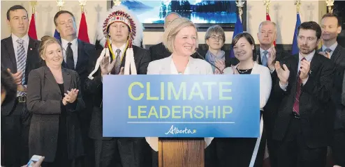  ??  ?? AMBER BRACKEN / THE CANADIAN PRESS Premier Rachel Notley unveiled Alberta’s climate strategy in Edmonton on Nov. 22, 2015, with the then support of some major oilsands leaders. They included, third from left, Murray Edwards of Canadian Natural; Steve...