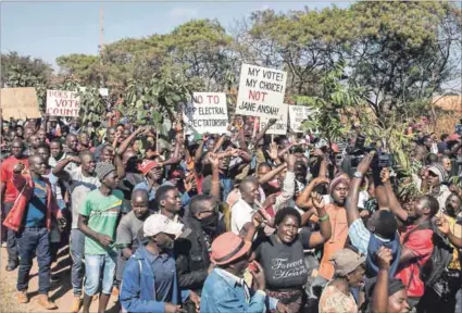  ?? Photo: Amos Gumulira/afp ?? Not my president: Thousands of demonstrat­ors claim that Malawi’s presidenti­al elections were rigged. The country’s Constituti­onal Court will pass judgment on the matter in the near future.