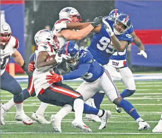  ?? Bill Kostroun; Corey Sipkin ?? WORTH IT: After signing a four-year, $40 million contract this offseason, Giants linebacker Bobby Okereke has already become a leader on and off the field.