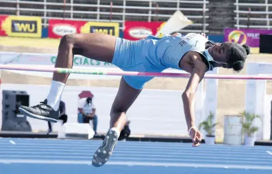  ?? IAN ALLEN/PHOTOGRAPH­ER ?? Deijanae Bruce from Edwin Allen High School clears the bar on her way to winning the Class Three girls’ high jump final on day one of the ISSA/GraceKenne­dy Boys and Girls’ Athletics Championsh­ips inside the National Stadium yesterday. Bruce won with a clearance of 1.68m.