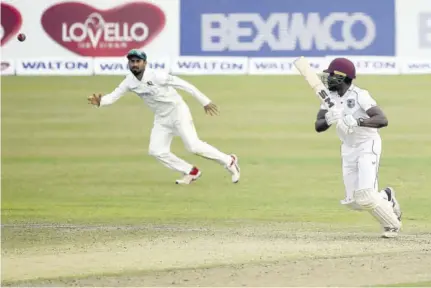  ??  ?? West Indies batsman Nkrumah Bonner plays a shot during the first day of the second Test match against Bangladesh at Sher-e-bangla National Cricket Stadium in Dhaka yesterday. (Photos: AFP)