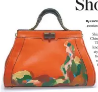  ?? PROVIDED TO CHINA DAILY ?? Jade Bracelet Bag, with handles crafted from jade, is one of the signature items from Shiatzy Chen.