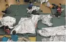  ?? BALTIMORE SUN ?? Advocates and doctors have reported health and hygiene problems among children held at Customs and Border Protection facilities in Texas.