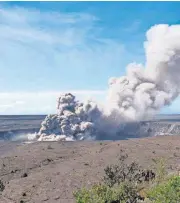  ?? [AP PHOTO] ?? In this photo released Friday by the U.S. Geological Survey, a weak ash plume rises from the Overlook Vent in Halema’uma’u crater of the Kilauea volcano on the Big Island of Hawaii. Geologists warn that the volcano could shoot out large boulders and...