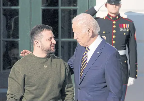  ?? REUTERS ?? US President Joe Biden welcomes Ukraine’s President Volodymyr Zelensky to the White House in Washington on Dec 21. Russia’s invasion has made Ukraine more reliant than ever on Western support, particular­ly in the form of military aid.