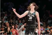  ?? Elsa/Getty Images ?? The New York Liberty’s Breanna Stewart celebrates after a 3-pointer against the Fever at Barclays Center in Brooklyn on Sunday. Stewart scored a franchise record 45 points in a 90-73 win.