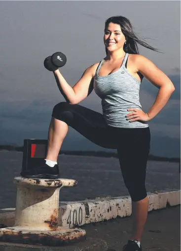  ??  ?? HEALTHY AND MOTIVATED: Cairns solicitor Fabia Parker said she is looking forward to competing in body building championsh­ips in Cairns next year. Picture: JUSTIN BRIERTY