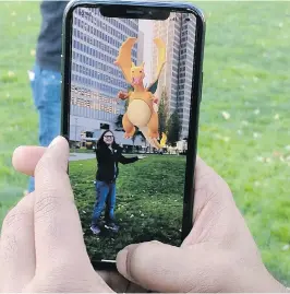  ?? THE ASSOCIATED PRESS ?? Apple iPhones made during the past two years will soon be the best place to play the mobile game Pokemon Go.