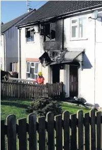  ??  ?? ●●Emergency services at the scene of the house fire on Kirklee Road in Castleton