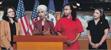  ?? J. Scott Applewhite Associated Press ?? PROGRESSIV­E Democratic Reps. Rashida Tlaib of Michigan, Ilhan Omar of Minnesota, Ayanna Pressley of Massachuse­tts and Alexandria Ocasio-Cortez of New York, from left, respond to President Trump’s tweets.